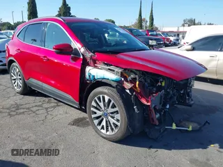 2020 Ford Escape Titanium Hybrid z VIN 1FMCU0DZ0LUC76763, wystawiony jako IAAI lot #40696114 z przebiegiem 61 234 mil mil oraz . Historia ofert i sprzedaży dostępna na DreamBid. Obrazek 1.