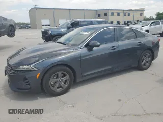 2023 Kia K5 LXS z VIN 5XXG14J24PG205185, wystawiony jako Copart lot #53436785 z przebiegiem 32 107 mil mil oraz Szkoda całkowita • Salvage title. Historia ofert i sprzedaży dostępna na DreamBid. Obrazek 1.
