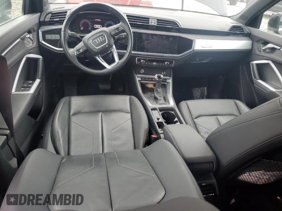 2020 Audi Q3 Premium with VIN WA1AECF35L1088335, listed as a Copart auction lot 65602815 with 53,926 mi miles and Salvage title. Bid and sale history available at DreamBid. Image 8.