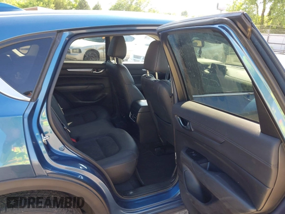 2020 Mazda CX-5 Touring z VIN JM3KFBCM2L0848233, wystawiony jako IAAI lot #42189719 z przebiegiem 80 893 mil mil oraz . Historia ofert i sprzedaży dostępna na DreamBid. Obrazek 8.