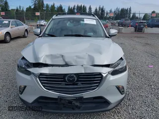 2017 Mazda CX-3 Grand Touring z VIN JM1DKFD70H0159621, wystawiony jako IAAI lot #42331482 z przebiegiem 55 166 mil mil oraz . Historia ofert i sprzedaży dostępna na DreamBid. Obrazek 6.