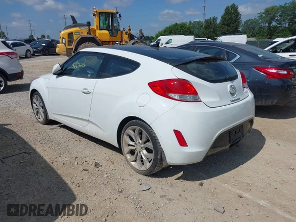 2013 Hyundai Veloster w/Black Int with VIN KMHTC6AD2DU131983, listed as a IAAI auction lot 42671646 with 131,731 mi miles and . Bid and sale history available at DreamBid. Image 3.