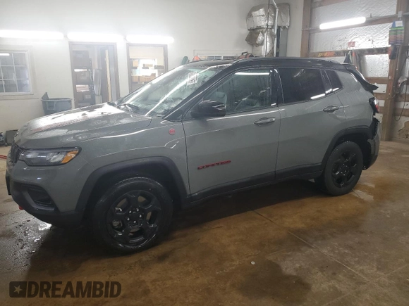 2023 Jeep Compass Trailhawk z VIN 3C4NJDDN9PT557910, wystawiony jako Copart lot #59387825 z przebiegiem 39 686 mil mil oraz Czysty tytuł • Clean title. Historia ofert i sprzedaży dostępna na DreamBid. Obrazek 1.