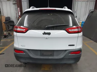 2016 Jeep Cherokee Altitude with VIN 1C4PJLCB7GW342904, listed as a IAAI auction lot 42281323 with 124,309 mi miles and . Bid and sale history available at DreamBid. Image 16.