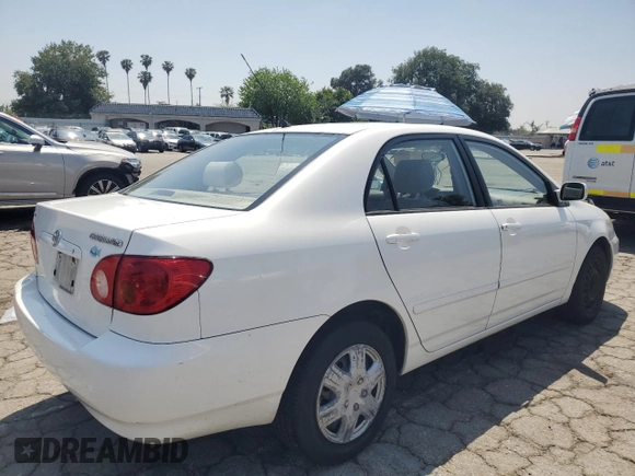 2003 Toyota Corolla CE with VIN JTDBR32E130042562, listed as a Copart auction lot 54989255 with 240,798 mi miles and Clean Title. Bid and sale history available at DreamBid. Image 3.