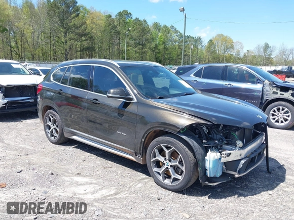 2016 BMW X1 xDrive28i with VIN WBXHT3C3XGP889833, listed as a IAAI auction lot 39118131 with 111,343 mi miles. Bid and sale history available at carsss.com. Image 1.