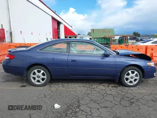 1999 Toyota Solara SE with VIN 2T1CF22P5XC163759, listed as a IAAI auction lot 41922973 with 146,042 mi miles. Bid and sale history available at carsss.com. Image 13.