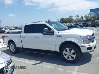 2018 Ford F-150 XL z VIN 1FTFW1EG9JFA95760, wystawiony jako IAAI lot #42299097 z przebiegiem 105 699 mil mil oraz . Historia ofert i sprzedaży dostępna na DreamBid. Obrazek 13.