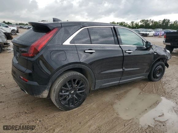 2023 Cadillac XT4 FWD Luxury with VIN 1GYAZAR45PF218684, listed as a Copart auction lot 54427565 with 74,920 mi miles and Salvage Title. Bid and sale history available at carsss.com. Image 3.