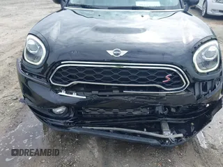 2017 MINI Countryman Cooper S with VIN WMZYT3C34H3D98585, listed as a IAAI auction lot 41752740 with 58,381 mi miles. Bid and sale history available at carsss.com. Image 20.