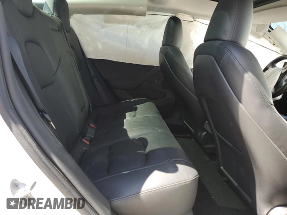 2023 Tesla Model 3 with VIN 5YJ3E1EA9PF558088, listed as a Copart auction lot 52228465 with 63,204 mi miles and Salvage title. Bid and sale history available at DreamBid. Image 10.