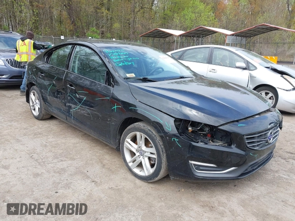 2015 Volvo S60 T5 Drive-E Premier with VIN YV140MFK6F1346875, listed as a IAAI auction lot 42004365 with 98,574 mi miles and . Bid and sale history available at DreamBid. Image 1.