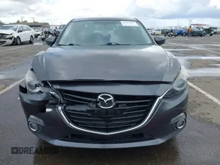 2014 Mazda 3 S Touring with VIN JM1BM1V31E1132448, listed as a IAAI auction lot 41815085 with 144,705 mi miles and . Bid and sale history available at DreamBid. Image 12.