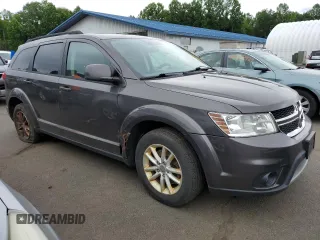 2015 Dodge Journey SXT with VIN 3C4PDCBG7FT669165, listed as a Copart auction lot 62682015 with 145,303 mi miles and Clean title. Bid and sale history available at DreamBid. Image 4.