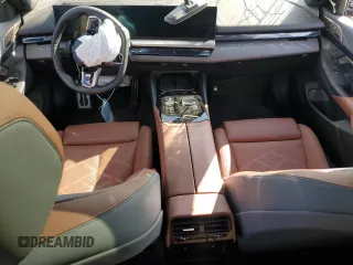 2024 BMW i5 eDrive40 with VIN WBY33FK04RCR49355, listed as a Copart auction lot 55828475 with Not Provided miles and Salvage Title. Bid and sale history available at DreamBid. Image 8.