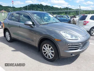 2014 Porsche Cayenne with VIN WP1AA2A2XELA91523, listed as a IAAI auction lot 42538298 with 67,001 mi miles and . Bid and sale history available at DreamBid. Image 1.