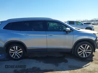 2017 Honda Pilot Touring with VIN 5FNYF5H93HB008088, listed as a IAAI auction lot 41699129 with 110,830 mi miles. Bid and sale history available at carsss.com. Image 13.