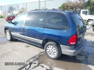 2000 Dodge Caravan SE with VIN 2B4GP45R9YR661145, listed as a IAAI auction lot 41819130 with 233,411 mi miles and . Bid and sale history available at DreamBid. Image 3.
