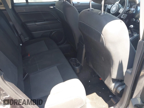 2016 Jeep Compass Sport with VIN 1C4NJCBA0GD560307, listed as a IAAI auction lot 42537535 with 178,194 mi miles and . Bid and sale history available at DreamBid. Image 8.