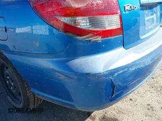 2003 Kia Rio with VIN KNADC125936239472, listed as a IAAI auction lot 41729536 with 156,421 mi miles. Bid and sale history available at carsss.com. Image 6.