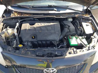 2009 Toyota Corolla with VIN 1NXBU40E99Z058710, listed as a IAAI auction lot 42073025 with 190,818 mi miles and . Bid and sale history available at DreamBid. Image 10.