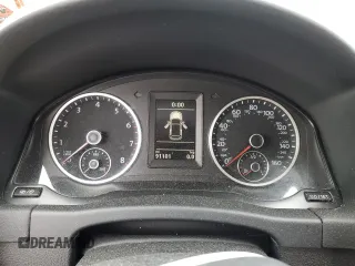 2014 Volkswagen Tiguan S z VIN WVGBV3AX5EW554500, wystawiony jako Copart lot #57016775 z przebiegiem 91 101 mil mil oraz Szkoda całkowita • Salvage title. Historia ofert i sprzedaży dostępna na DreamBid. Obrazek 9.