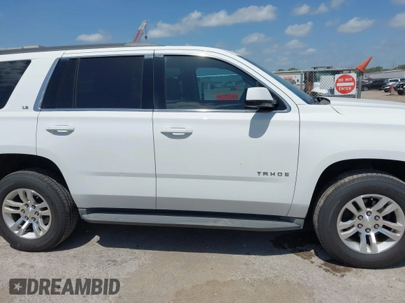 2015 Chevrolet Tahoe LS z VIN 1GNSCAKC6FR239156, wystawiony jako IAAI lot #42545513 z przebiegiem 117 863 mil mil oraz . Historia ofert i sprzedaży dostępna na DreamBid. Obrazek 13.