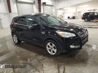 2016 Ford Escape SE with VIN 1FMCU9GX6GUA16825, listed as a Copart auction lot 48536825 with 153,053 mi miles and Salvage Title. Bid and sale history available at DreamBid. Image 4.