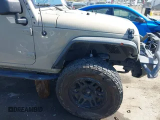 2017 Jeep Wrangler Unlimited Sahara with VIN 1C4BJWEG1HL746854, listed as a IAAI auction lot 41948127 with 97,730 mi miles. Bid and sale history available at carsss.com. Image 17.