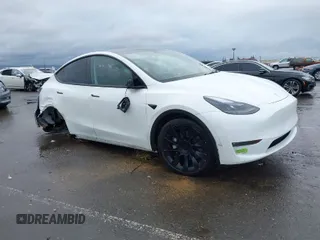 2023 Tesla Model Y Long Range z VIN 7SAYGDEE5PF753922, wystawiony jako IAAI lot #41529511 z przebiegiem 50 731 mil mil oraz . Historia ofert i sprzedaży dostępna na DreamBid. Obrazek 1.