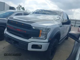 2018 Ford F-150 XL with VIN 1FTEW1E51JKF09051, listed as a IAAI auction lot 41532739 with 98,864 mi miles. Bid and sale history available at carsss.com. Image 2.