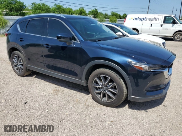 2018 Mazda CX-5 Grand Touring с VIN JM3KFBDM8J0344328, выставлен на аукционе Copart как лот 57665175 с пробегом 131 175 миль миль и Списание • Salvage title. История ставок и продаж доступна на DreamBid. Изображение 4.