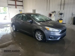 2015 Ford Focus SE with VIN 1FADP3F29FL310622, listed as a Copart auction lot 63591065 with 119,957 mi miles and Salvage title. Bid and sale history available at DreamBid. Image 4.