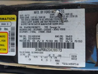 2013 Ford Fusion Titanium Hybrid with VIN 3FA6P0RU2DR288773, listed as a IAAI auction lot 41803708 with 85,868 mi miles and . Bid and sale history available at DreamBid. Image 9.