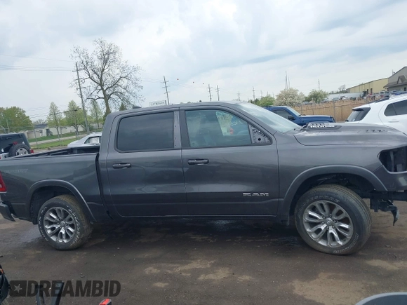 2022 Ram 1500 Laramie with VIN 1C6SRFJT3NN400159, listed as a IAAI auction lot 42167812 with 16,790 mi miles and . Bid and sale history available at DreamBid. Image 14.