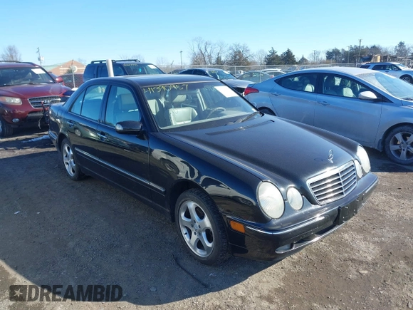 2002 Mercedes-Benz E-Class with VIN WDBJF82JX2X072422, listed as a IAAI auction lot 41390957 with 132,825 mi miles. Bid and sale history available at carsss.com. Image 1.