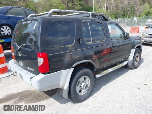 2000 Nissan Xterra XE with VIN 5N1ED28Y9YC604703, listed as a IAAI auction lot 42095801 with 250,603 mi miles. Bid and sale history available at carsss.com. Image 4.