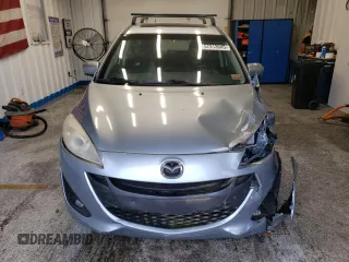 2012 Mazda 5 Touring z VIN JM1CW2CL6C0107720, wystawiony jako Copart lot #57313045 z przebiegiem 112 051 mil mil oraz Szkoda całkowita • Salvage title. Historia ofert i sprzedaży dostępna na DreamBid. Obrazek 5.