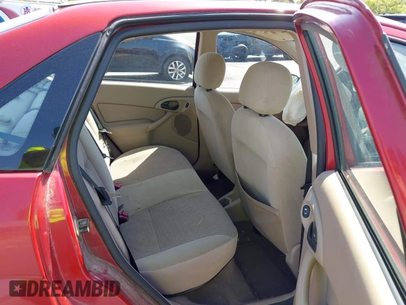 2003 Ford Focus SE with VIN 1FAFP34P93W340236, listed as a IAAI auction lot 41994554 with 92,457 mi miles and . Bid and sale history available at carsss.com. Image 8.