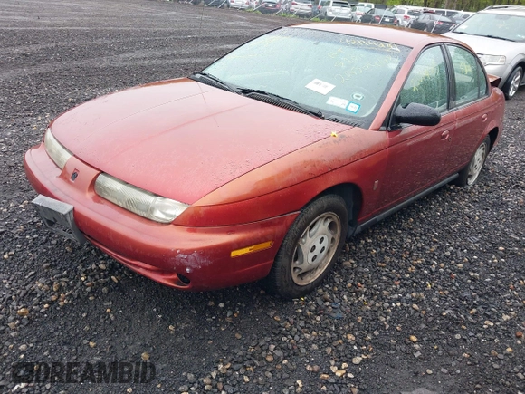 1996 Saturn SL with VIN 1G8ZK5273TZ268401, listed as a IAAI auction lot 42194239 with Not provided miles and . Bid and sale history available at DreamBid. Image 2.