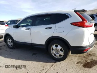 2019 Honda CR-V LX with VIN 2HKRW6H3XKH227693, listed as a Copart auction lot 74258544 with 54,928 mi miles and Salvage Title. Bid and sale history available at carsss.com. Image 2.