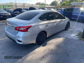 2019 Nissan Sentra S with VIN 3N1AB7AP5KY332143, listed as a IAAI auction lot 42196842 with 51,386 mi miles and . Bid and sale history available at DreamBid. Image 4.