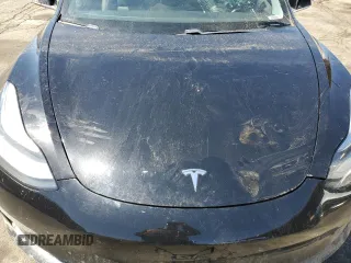 2019 Tesla Model 3 Long Range with VIN 5YJ3E1EB8KF451535, listed as a Copart auction lot 53085105 with 133,928 mi miles and Non Repairable. Bid and sale history available at DreamBid. Image 12.