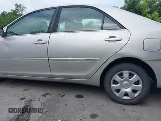 2004 Toyota Camry LE with VIN 4T1BE32K14U857478, listed as a IAAI auction lot 42654878 with 210,542 mi miles and . Bid and sale history available at DreamBid. Image 6.