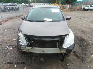 2015 Nissan Versa SV with VIN 3N1CN7AP7FL869485, listed as a IAAI auction lot 42077524 with 198,646 mi miles. Bid and sale history available at carsss.com. Image 12.