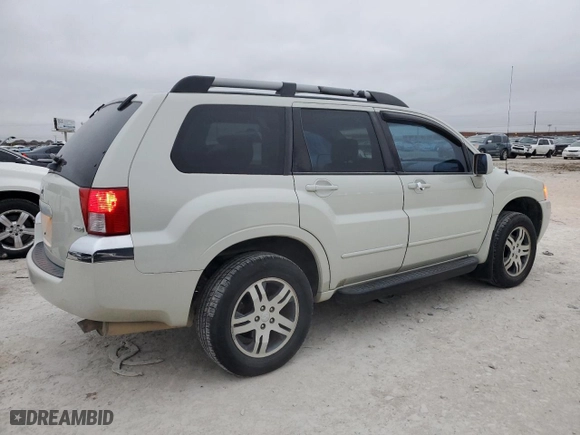 2004 Mitsubishi Endeavor XLS with VIN 4A4MM31S14E056988, listed as a Copart auction lot 84604114 with 153,434 mi miles and Salvage Title. Bid and sale history available at carsss.com. Image 3.