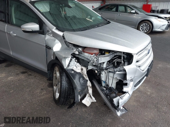 2019 Ford Escape Titanium with VIN 1FMCU9J9XKUA37695, listed as a IAAI auction lot 41868388 with 50,095 mi miles. Bid and sale history available at carsss.com. Image 6.