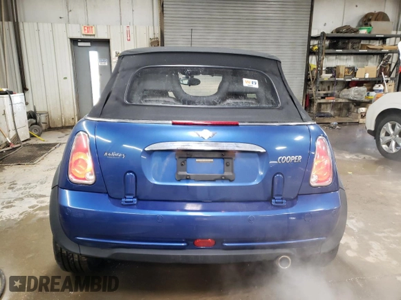 2007 MINI Convertible with VIN WMWRF33507TG16448, listed as a Copart auction lot 88474495 with 148,147 mi miles and Salvage Title. Bid and sale history available at DreamBid. Image 6.