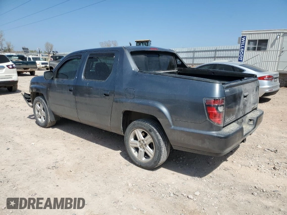 2013 Honda Ridgeline RTL with VIN 5FPYK1F51DB012680, listed as a Copart auction lot 50987085 with 63,372 mi miles and Salvage Title. Bid and sale history available at carsss.com. Image 2.