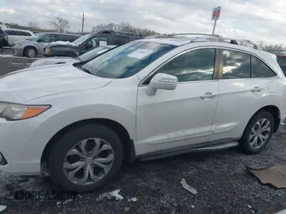 2015 Acura RDX Tech Pkg with VIN 5J8TB4H56FL000513, listed as a IAAI auction lot 41283811 with 167,324 mi miles. Bid and sale history available at carsss.com. Image 14.